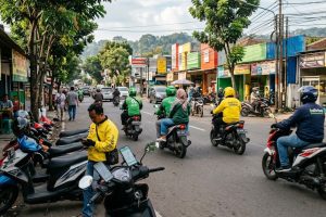 Mengapa Kantong Kita Kian Terjepit Si Hijau, dan Bagaimana Dua Kuda Hitam Mengacak-acak Pasar Ojol Indonesia
